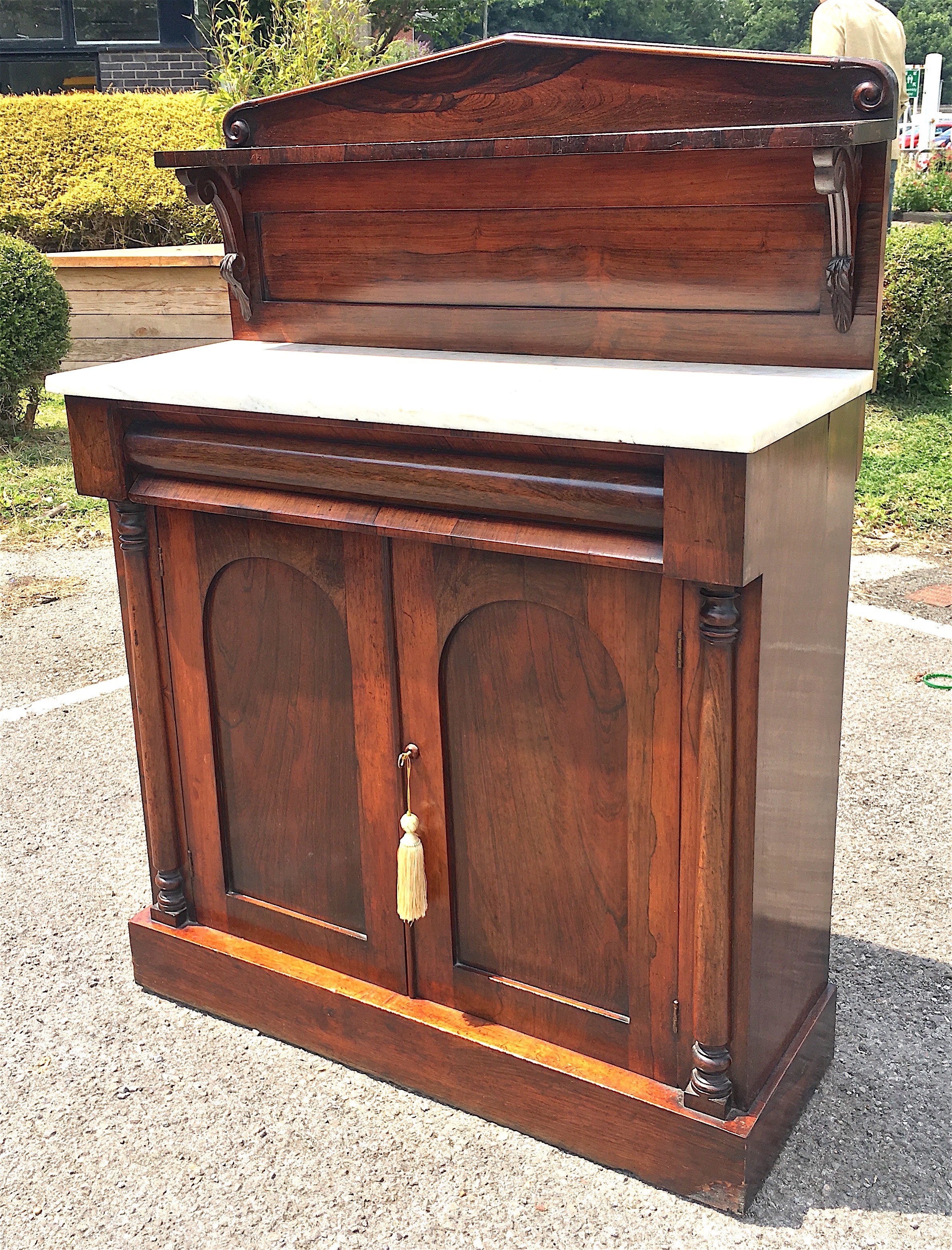 An early Victorian marble topped rosewood chiffonier, width 89cm depth 37cm height 122cm